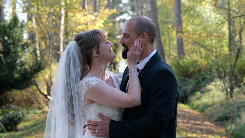 Rebecca and Ross during their intimate autumn wedding at Woodhill Hall, captured by a Woodhill Hall wedding videographer.